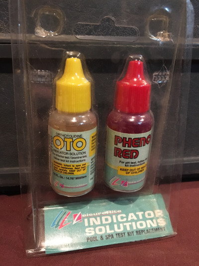 OTO and phenol red bottles in an older swimming pool water test kit